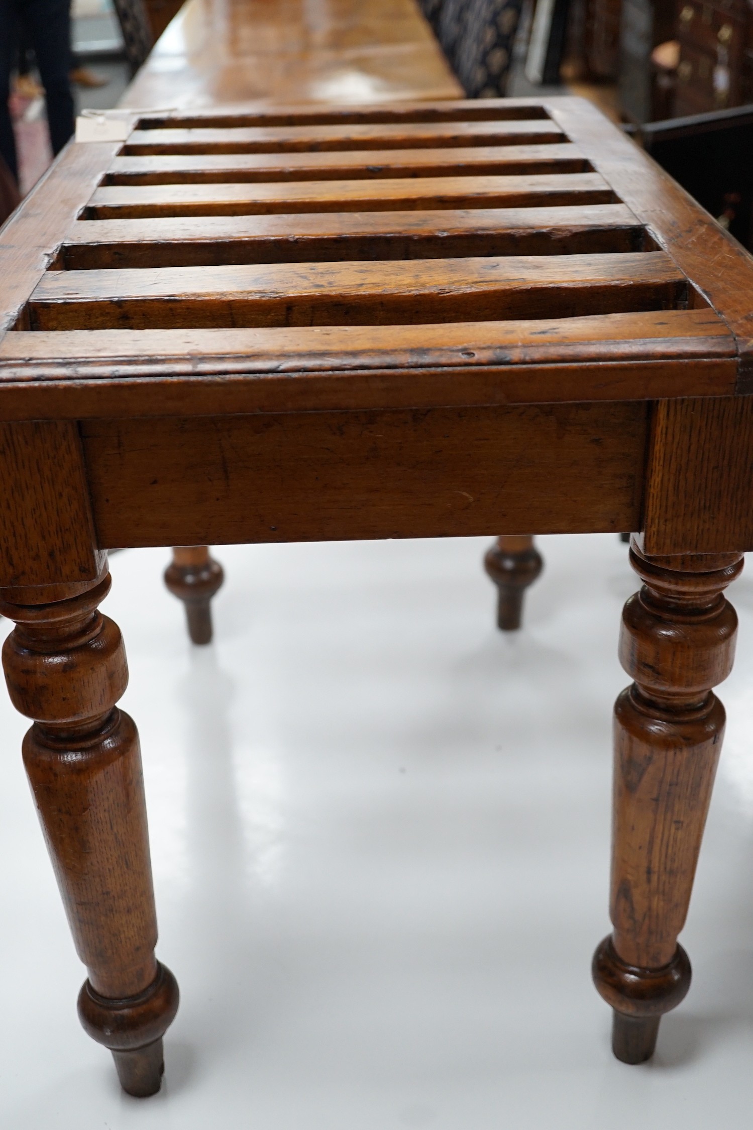 An Edwardian oak and beech luggage rack, width 60cm *Please note the sale commences at 9am.